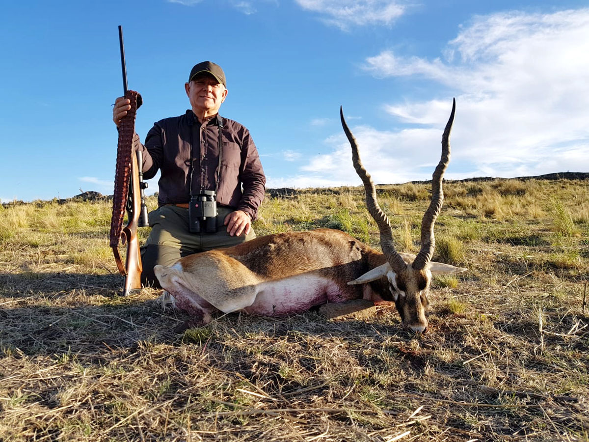 Hunter with a blackbuck trophy, hunting in Argentina