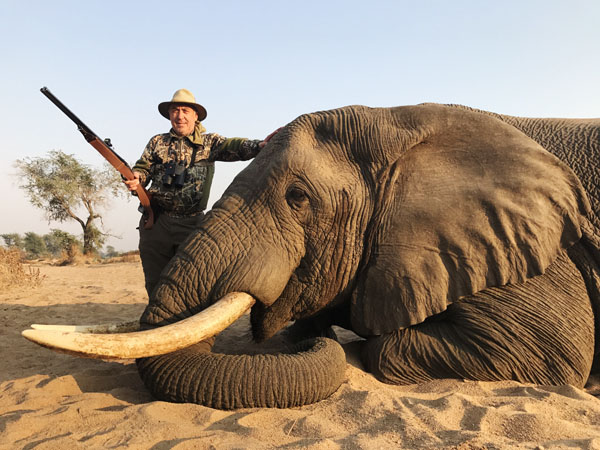 Hunter with an elephant trophy, hunting in Zimbabwe