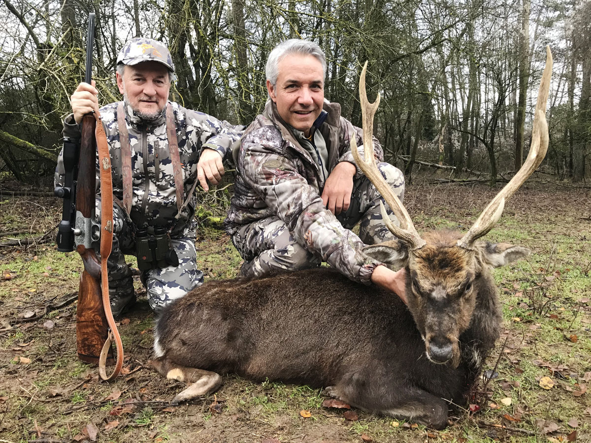 Hunter with a sika deer trophy in France