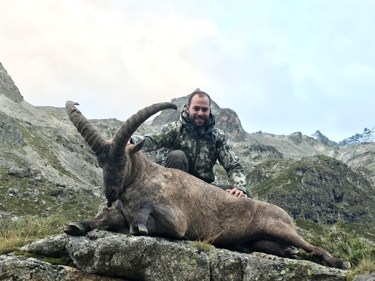 Hunter with a Kuban tur trophy, hunting in Russia